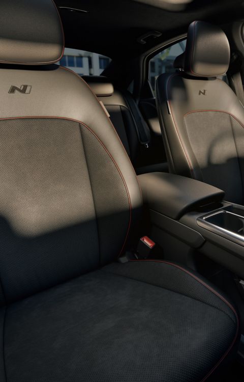 N Line sport seats inside a Hyundai IONIQ 6 N Line electric sedan.
